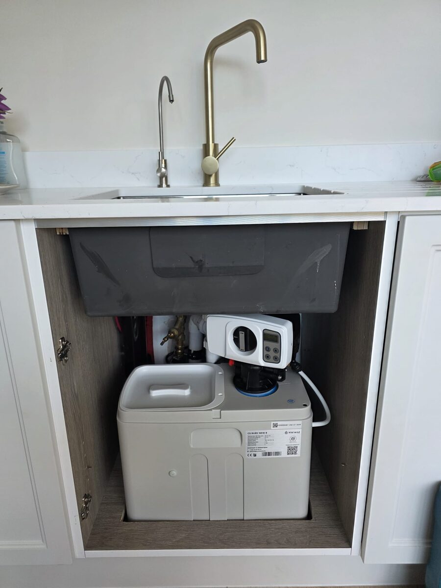 Klarwood CS Ruby New 8 softener neatly fitted inside a kitchen sink cabinet